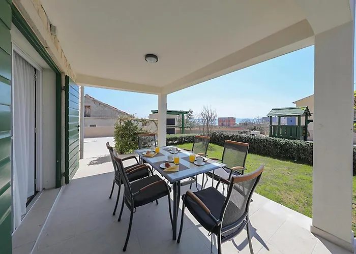 In Апартаменты *